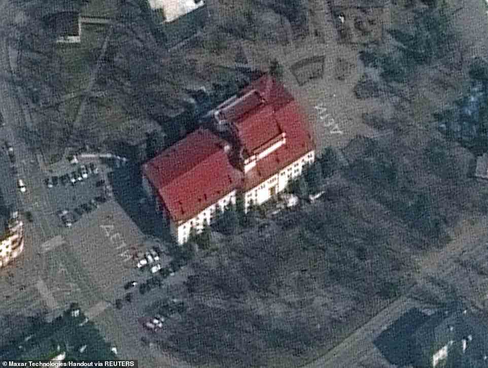 Satellite imagery from Monday showed the word 'children' written in large white letters in Russian in front of and behind the theatre building in an effort to stave off any attack by Putin's forces
