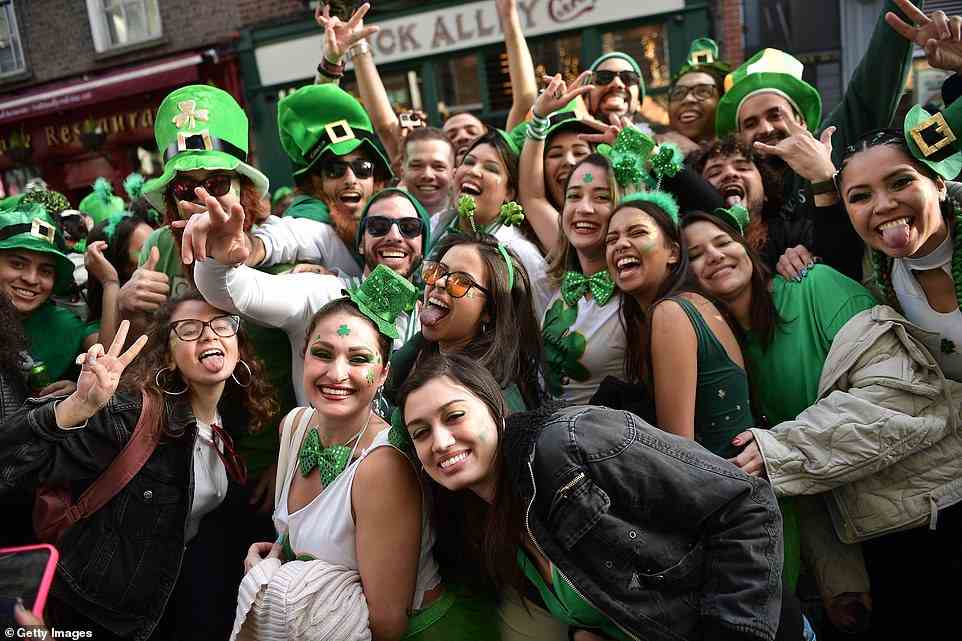 Having a good time! A group of revellers who packed the Temple Bar district following the annual Saint Patrick's day parade in Ireland