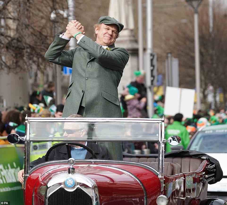 American-Irish actor Reilly was seen waving at the crowds as he was driven through the St Patrick's Day Parade in Dublin today