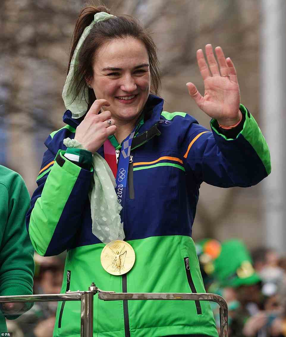 Grand Marshals Olympic gold medal boxer Kellie Harrington waved to crowds as she took part in the St Patrick's Day Parade in Dublin today