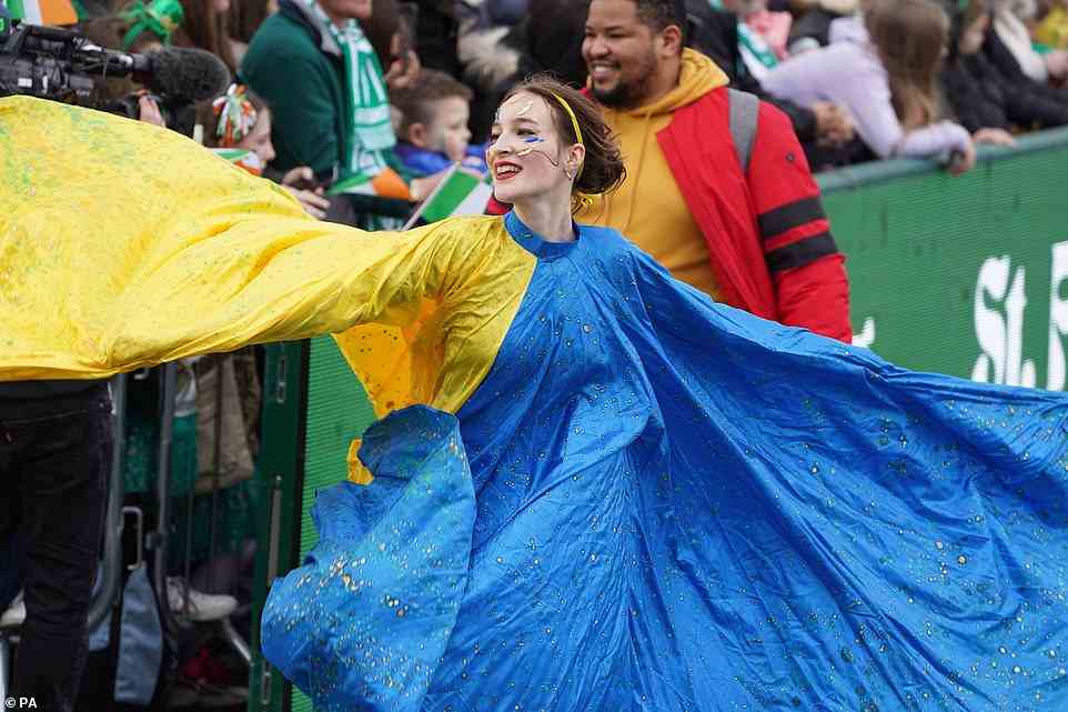 A performer danced through at the St Patrick's Day Parade in Dublin, the streets as crowds looked on
