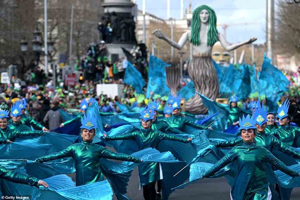 Performers danced through the streets of Dublin as they celebrated St Patrick's Day with a parade for the first time in two years