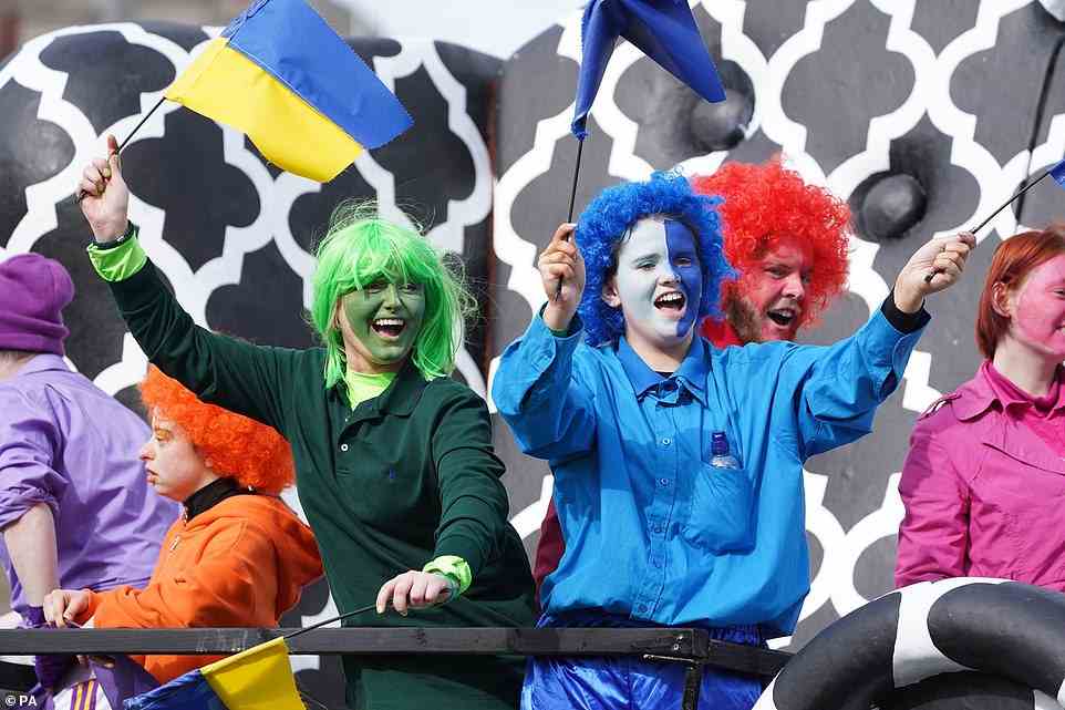Performers waved the flag of Ukraine as they travelled through the streets of Dublin as part of the St Patrick's Day Parade
