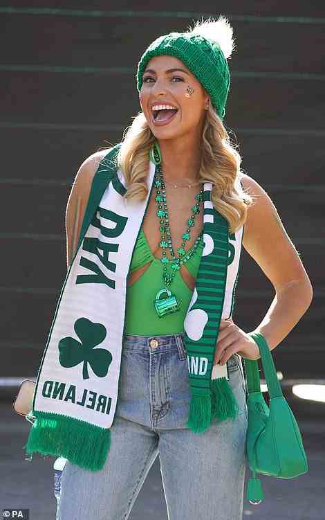 One American reveller was seen donning a green bodysuit paired with a shamrock-themed necklace and an Ireland scarf