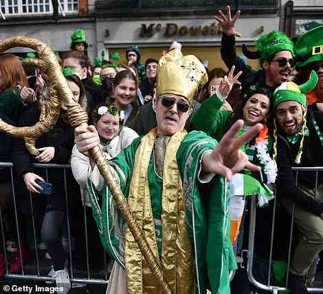 A man in fancy dress delighted the crowd of revellers as he took part in the parade to celebrate St Patrick's Day today in Dublin