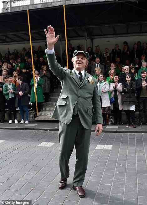 International guest of honour John C. Reilly was seen waving to the crowds of revellers as he celebrated St Patrick's Day during the parade
