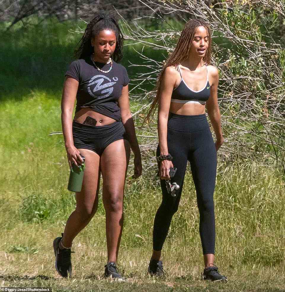 Fitness first: Both Sasha, 20, and Malia, 23, put on a sporty display for their outing, donning workout-appropriate outfits and matching Nike sneakers