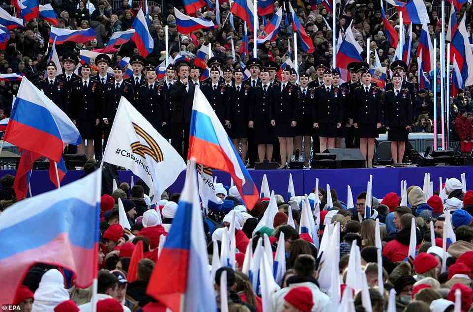 A military choir performs during a rally in support of Vladimir Putin's war on Ukraine in Moscow on Friday