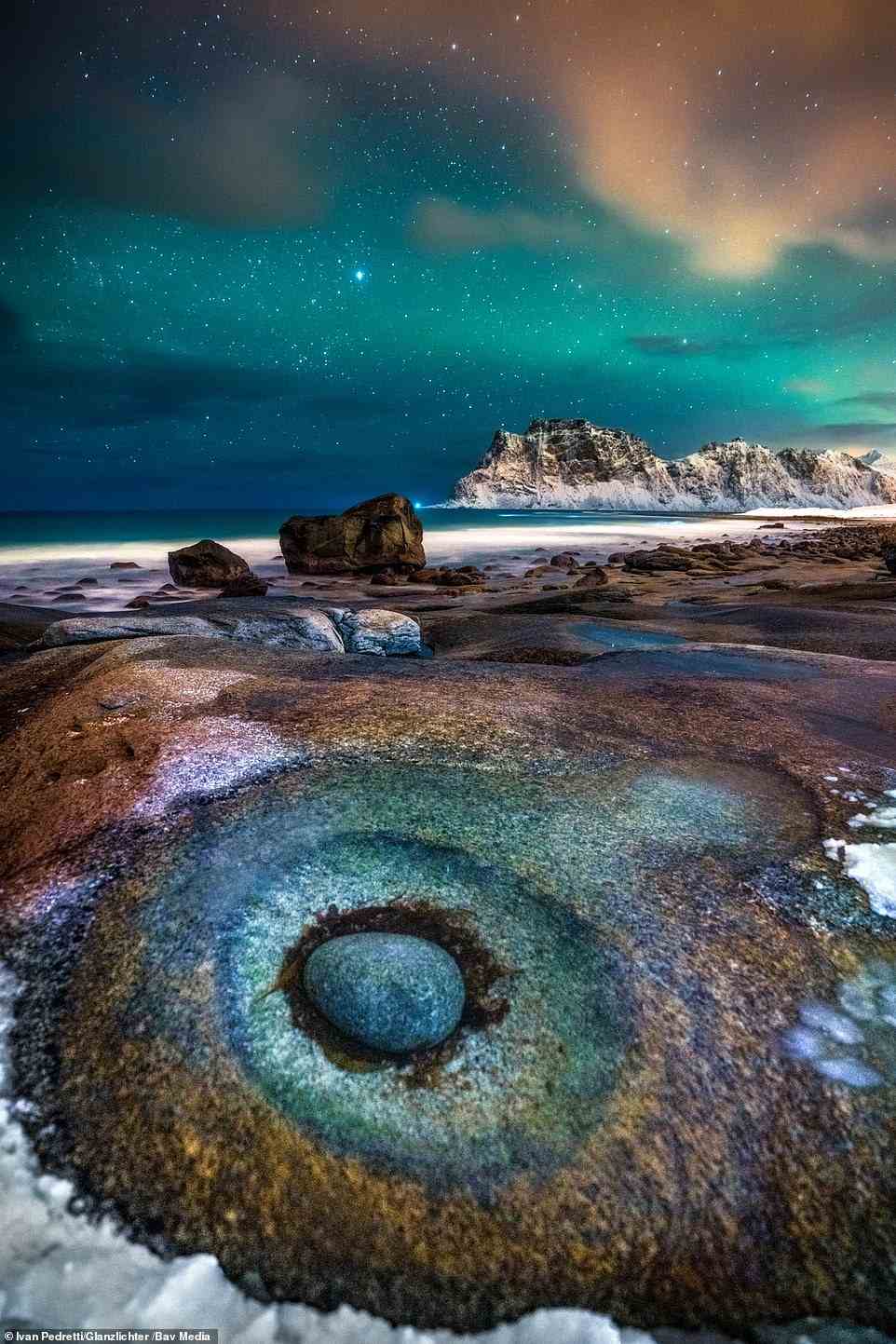 Norway is the only country to feature in multiple Glanzlichter finalists - and with landscapes like this, it's not hard to see why. Italian photographer Ivan Pedretti captured this audacious shot of an eye-shaped rock sitting beneath the Northern Lights on the island of Lofoten in February 2020, just weeks before the Covid pandemic. Pedretti's photo is a stunning illustration of peace, which now seems distant. That might be why it was the overall winner of this year's Glanzlichter Competition - meaning the €2,500 is his to keep.