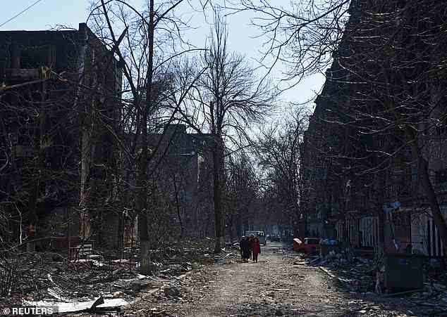 Eine Evakuierung von Zivilisten aus sicheren Korridoren, aufgenommen am 18. März in Mariupol, Ukraine