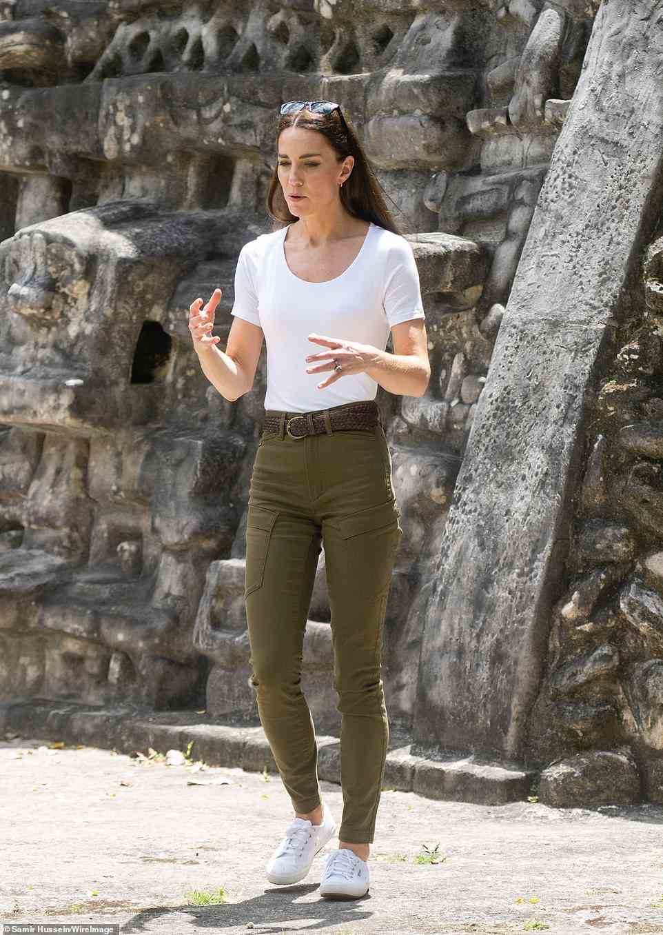 Kate could be seen gesturing at the site while at ground level and when they climbed half way up Caana and looked out from a platform, the couple stood with their hands on their hips looking around