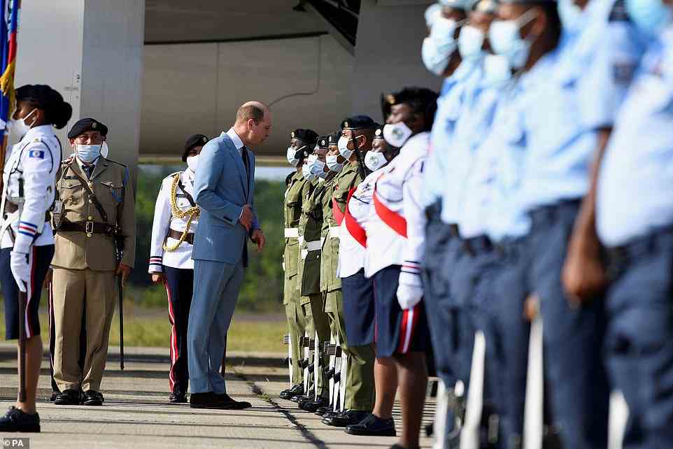 William stops to talk to members of the Honour Guard at Belize airport
