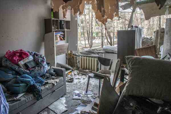 A living room that has been blasted open.