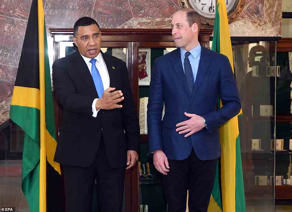 Prince William and Jamaica's premier Andrew Holness are pictured during a meeting at the Prime Minister's residence in Jamaica, Kingston, on Wednesday