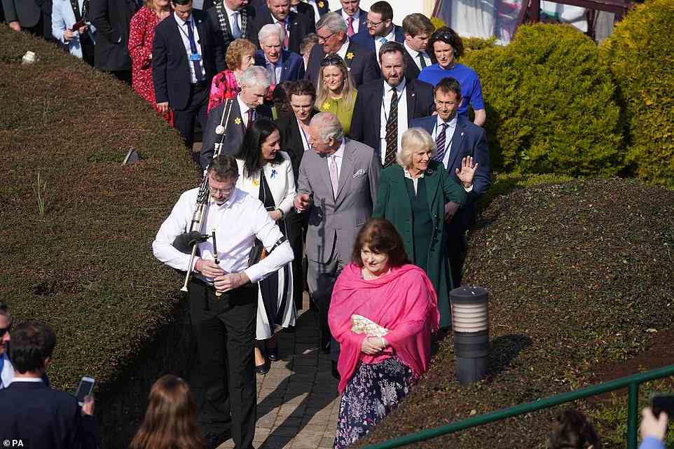 The Prince of Wales (centre) and the Duchess of Cornwall (centre right) with Minister for Tourism, Culture, Arts, Catherine Martin (centre left) leave the Bru Boru Cultural Centre in Cashel, County Tipperary