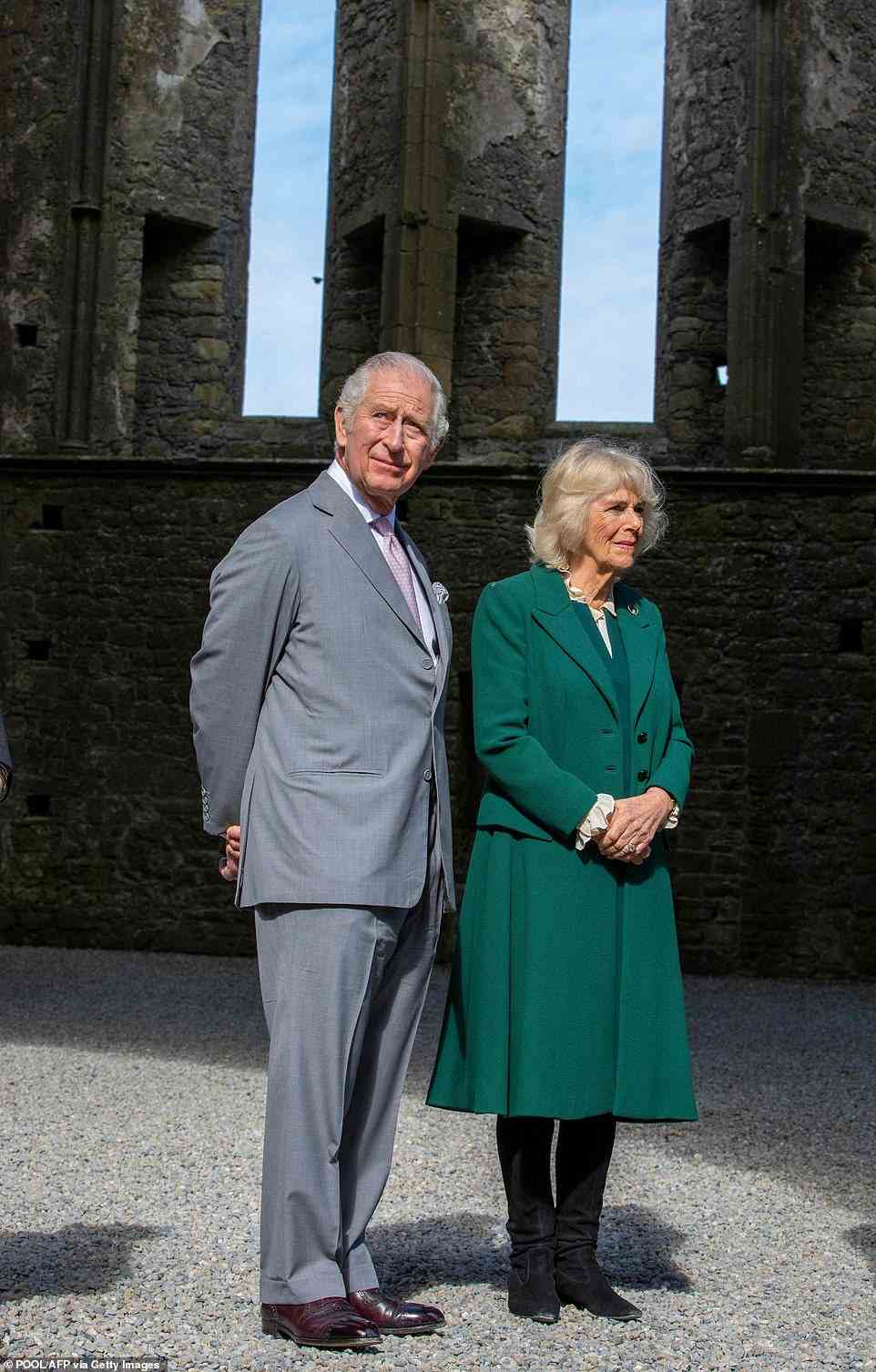 Prince of Wales and Duchess of Cornwall pose for photographs at the ancient site of the rock of Cashel in Co Tipperary