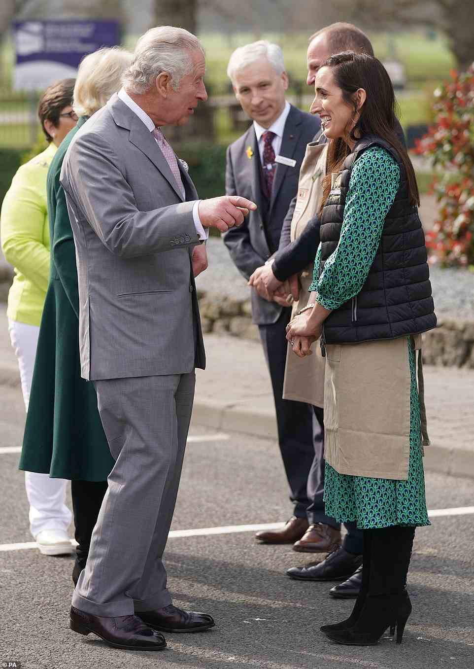 Charles and Camilla chatted with the enthusiastic farmers and locals who greeted them at thre market this morning