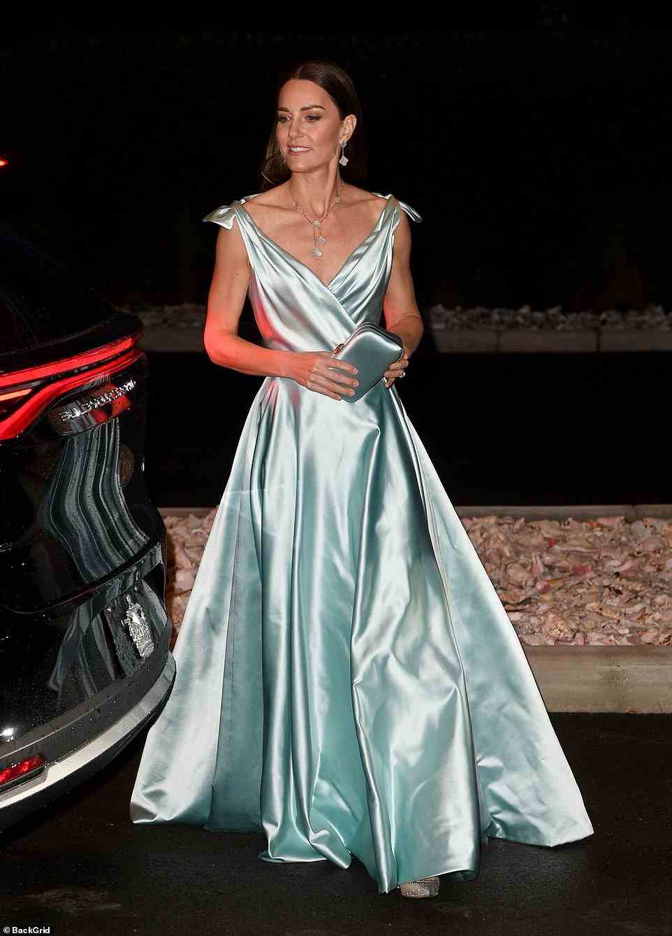 The floor-length icy blue gown is by British designer Phillipa Lepley, who is London’s go-to couturier for stylish dresses