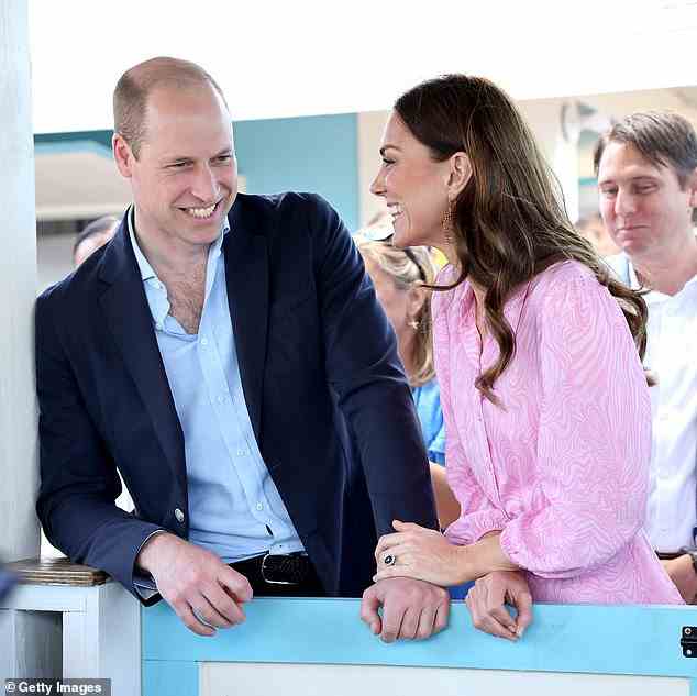 On Saturday, the couple visited a  fish fry with Kate, in a pink Rixo dress, trying local delicacy ‘conch pistol’ and putting a loving arm on Prince William
