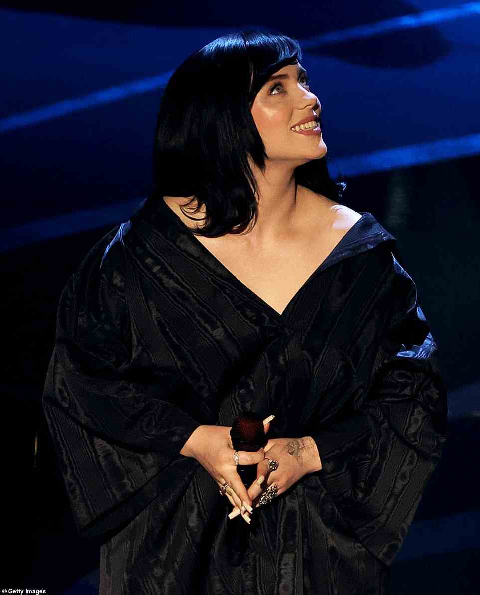 All eyes on her: Earlier in the night Billie had the audience in thrall on Sunday as she performed a soaring version of her James Bond theme song No Time To Die at the 2022 Academy Awards in Hollywood on Sunday