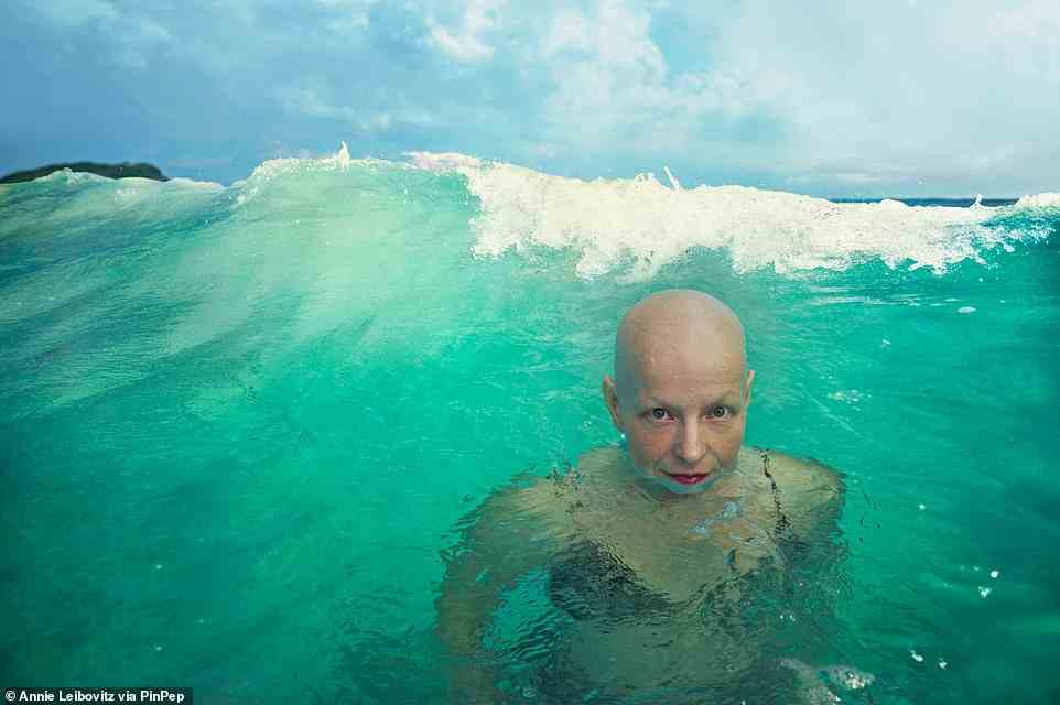 This is Rachel Fleit, a Brooklyn-based writer and creative director of Killer Films Media, and proud advocate for women with Alopecia, captured by Leibovitz taking a dip in the sea