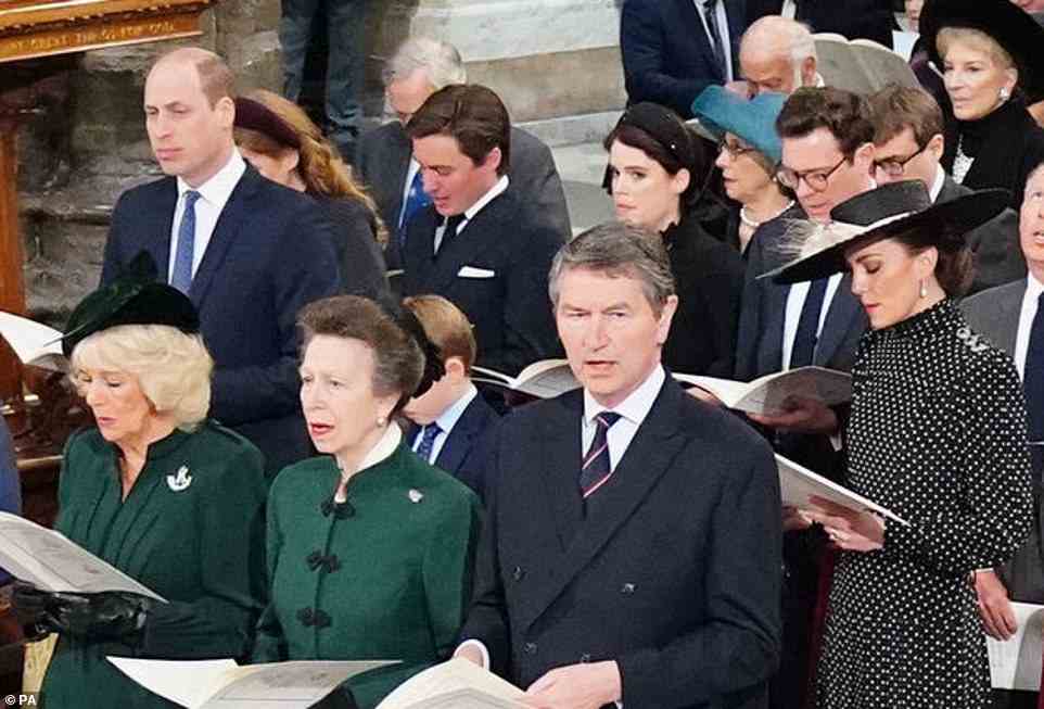 Wearing racing green to reflect the livery of Prince Philip's military regiment, the Duchess of Cornwall and Princess Royal - alongside Tim Laurence - were seated in front of the Duke and Duchess of Cambridge