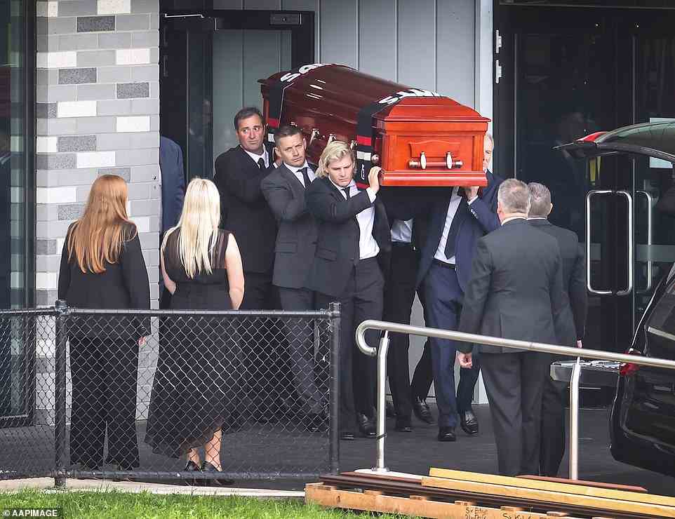 Jackson Warne helped to carry his father's coffin as Brooke and Summer watched on during Sunday's service