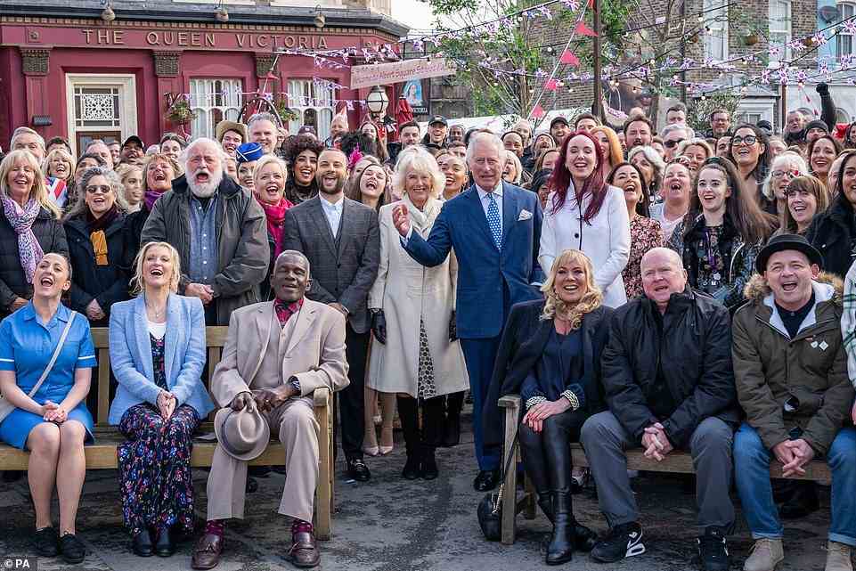 Royally good sports! Prince Charles and the Duchess of Cornwall posef for a group photo witht the cast after meeting show stalwarts such as Gillian Taylforth, Letitia Dean and Steve McFadden
