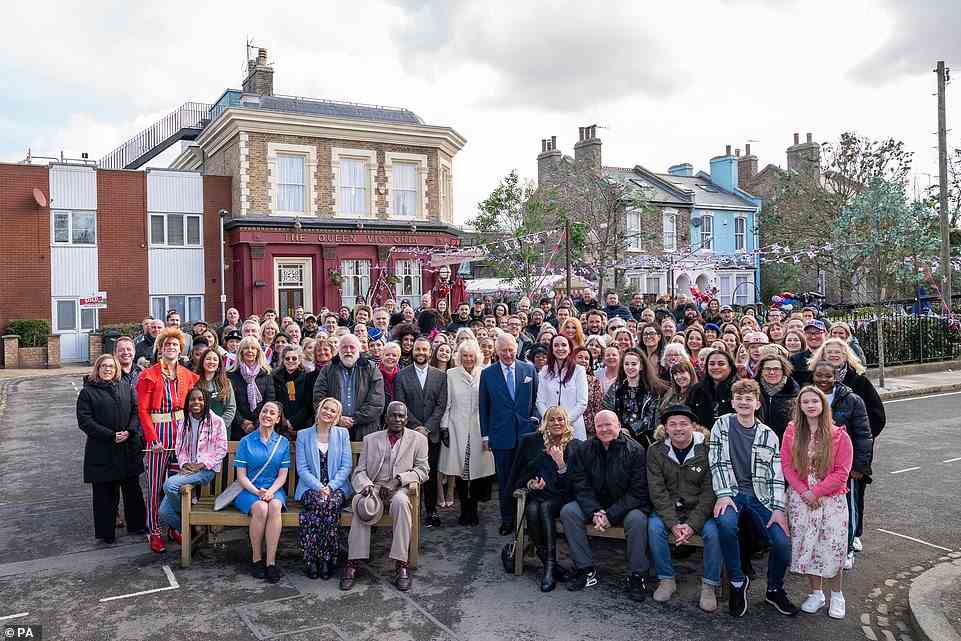 At the end of the visit, the cast and crew of Eastenders posed for a group picture with the Prince of Wales and the Duchess of Cornwall