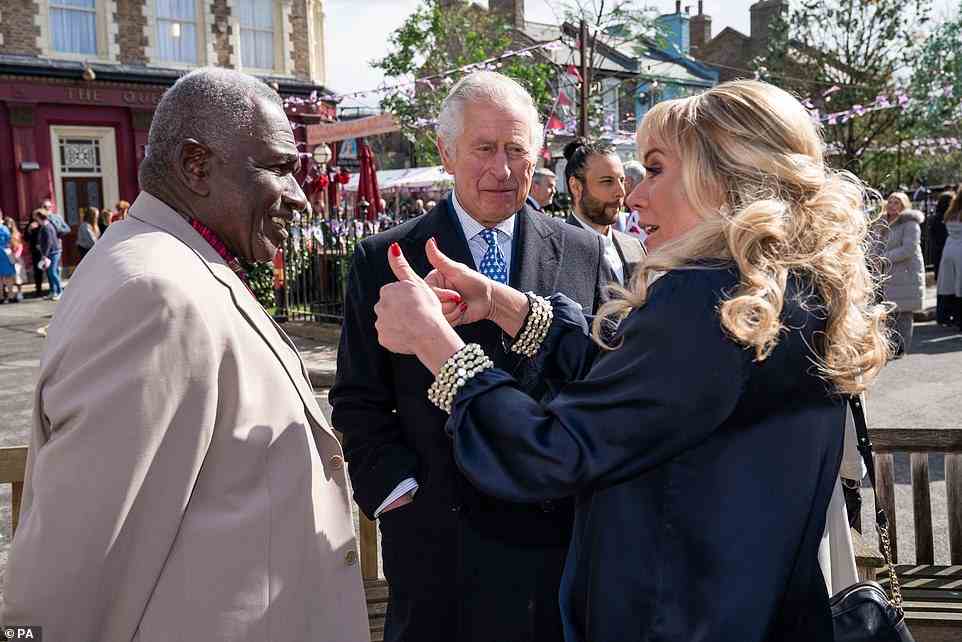 Royal thumb up! Letitia Dean put on a vey animated display as she and Rudolph Walker met with Charles
