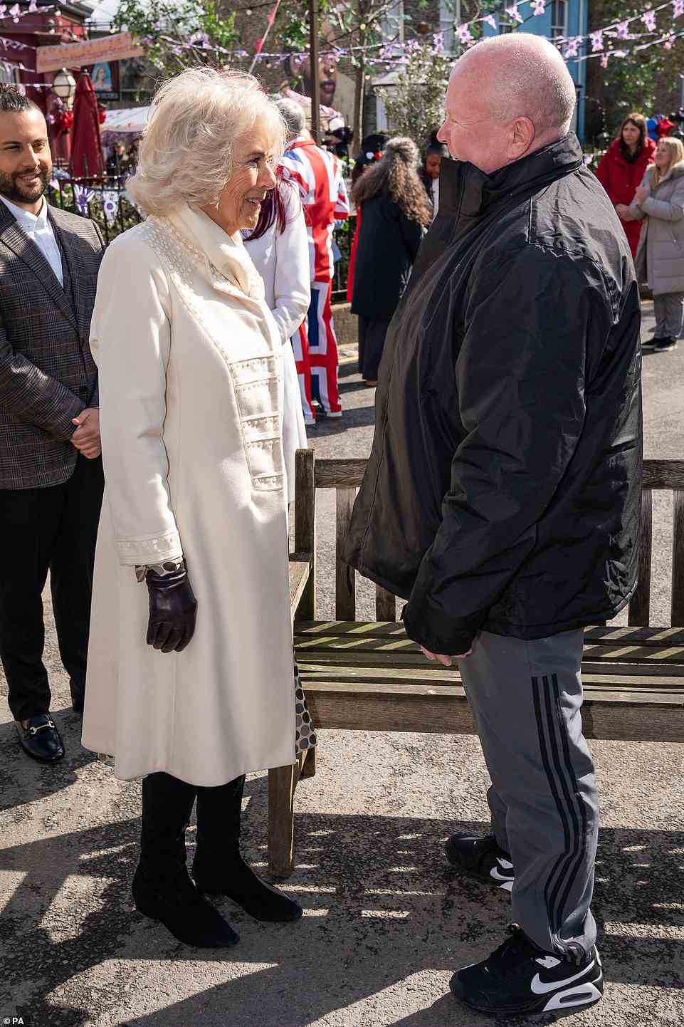 Steve McFadden was wearing a tracksuit for the visit. The Duchess of Cornwall opted for a cream coat by Anna Valentine