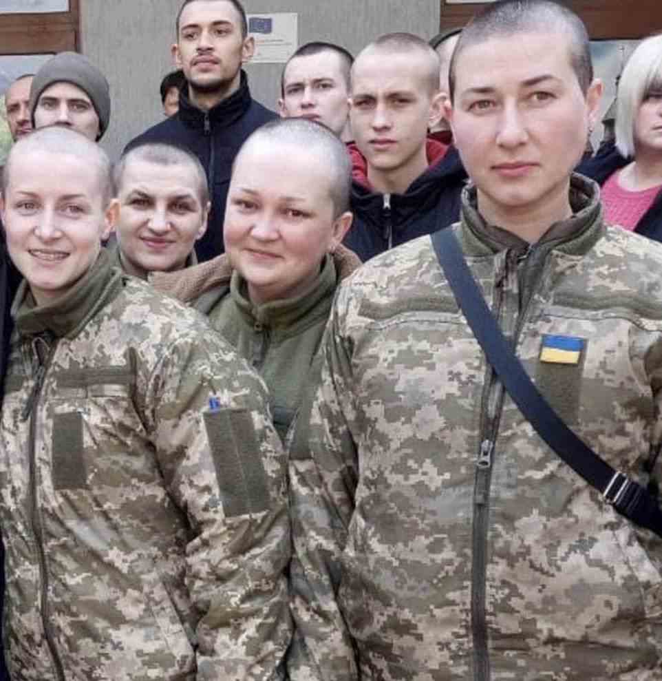 A third image (above) portrays female soldiers returned to Ukraine in a prisoner swap. Their heads have been shaved in humiliation by captors trying to strip them of dignity