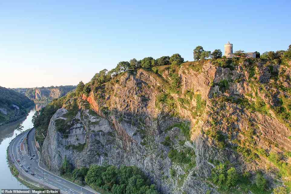 AVON GORGE, BRISTOL: Over 200m (656ft) wide and 90m (295ft) tall, this gorge, the author says, is said to have been carved out by a giant called Ghyston. He reveals: 'Ghyston undertook the immense task of creating the gorge to win the affections of Avona, goddess of the river Avon. He lived in a cave which emerges 30m below the clifftop on the Clifton side of the gorge and for a small fee his dwelling place, the Giant’s Cave, can be reached from inside the Clifton Observatory.' Coordinates: 51.4564, -2.6270