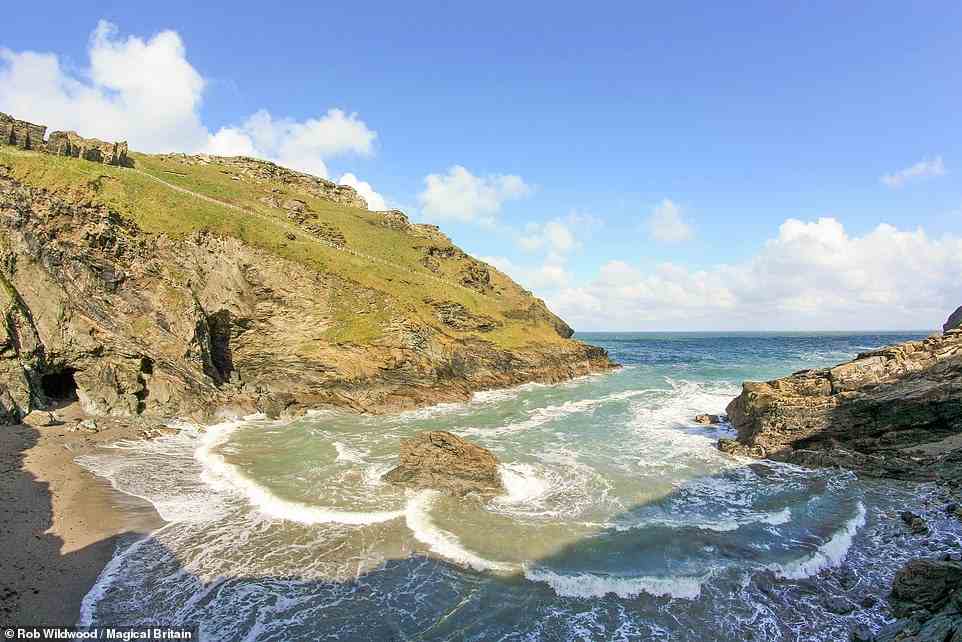 TINTAGEL, CORNWALL: This spot is said be the legendary birthplace of King Arthur, says Wildwood. 'When Arthur was born, there were many who wanted to kill him so Merlin hid him in what is now known as Merlin's Cave,' he explains. Although it's flooded every day by the tide, at low tide it is possible to walk there via Tintagel Haven beach. People who have done this have had 'mystical experiences' that have 'transformed their lives and set them on magical quests', the book adds. Coordinates: 50.6682, -4.7593