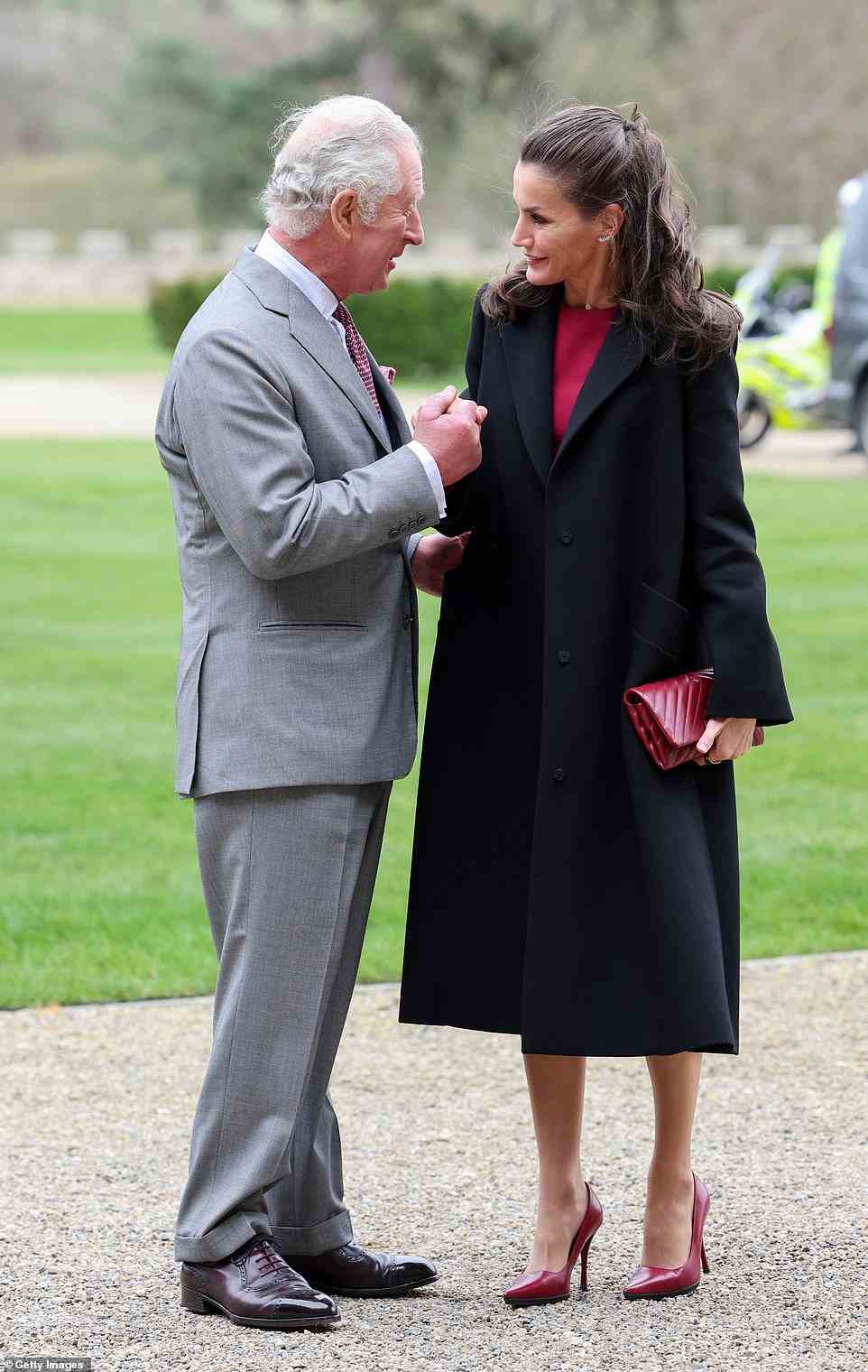 The 73-year-old could be seen holding the hand of the Spanish royal as the pair met in County Durham for the rare joint appearance earlier today