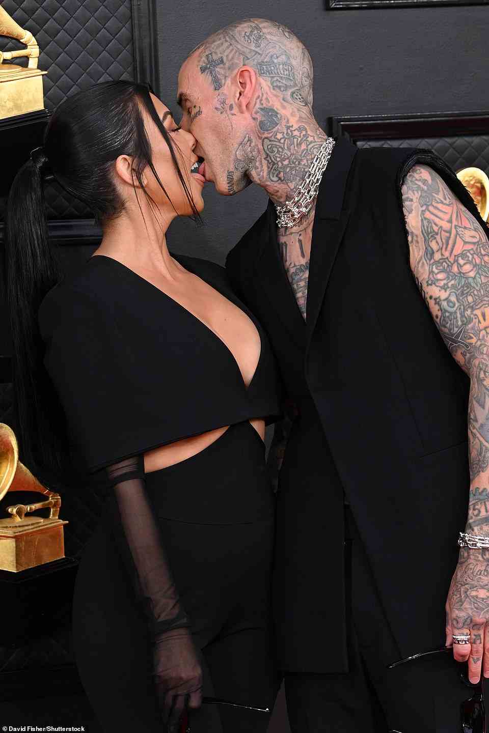 Can't be stopped: It was also a night for PDA, as Kourtney and Travis couldn't keep their hands — and tongues — to themselves on the Grammys red carpet and during the actual show hours prior to the wedding ceremony