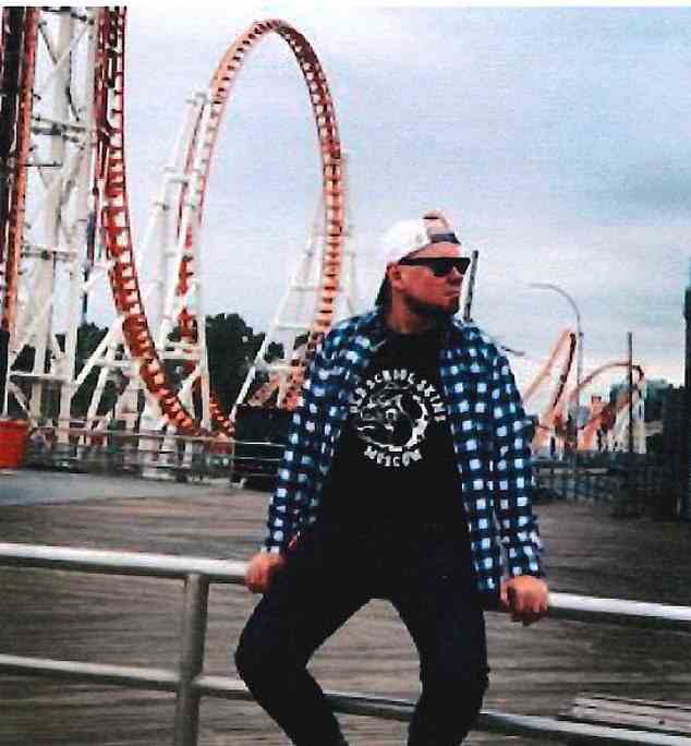 Kolchin is pictured in the OSS bulldog t-shirt in Coney Island