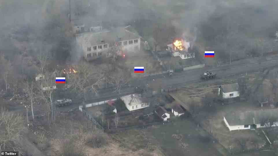 The convoy fired rounds into nearby buildings and also directed fire across neighbouring fields, seemingly at targets off camera, but the lone Ukrainian tank remained hidden as it continued to pound the invaders with shells, ultimately destroying two vehicles