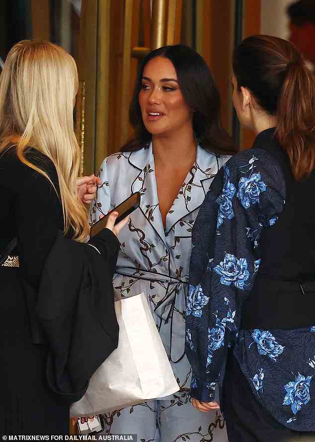 Something blue: She was spotted chatting to guests outside of the hotel in a pair of blue pyjamas