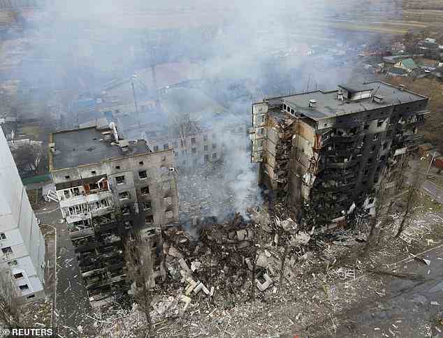 She then recalled being woken from the sound of an explosion. A residential building destroyed during the war in the Kyiv region is pictured on March 3