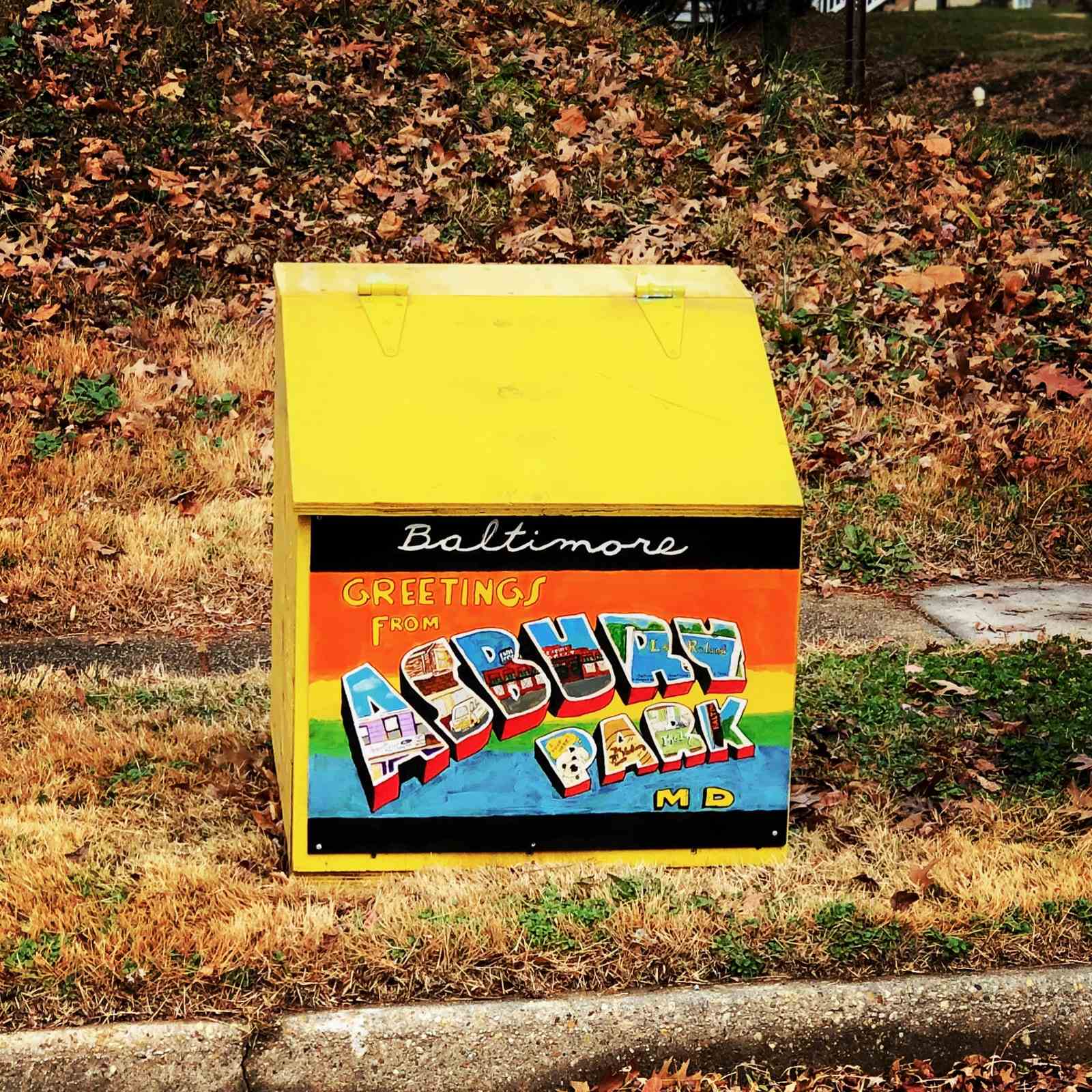 A yellow salt box with an Asbury Parkthemed illustration.