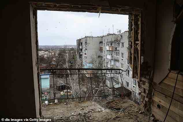 Buildings are shown destroyed or severely damaged by the attacks of Russian forces in the Makariv region on Sunday
