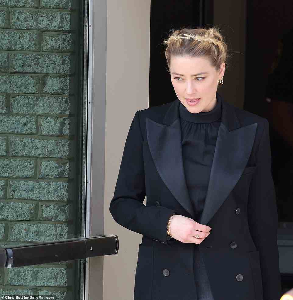 Amber Heard leaves court Thursday after her longtime marriage counselor revealed actress' turbulent relationship with Depp