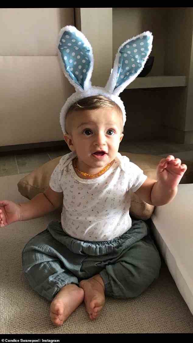 Family time: 'Happy Easter,' she wrote, while both she and her son wore colorful bunny ears