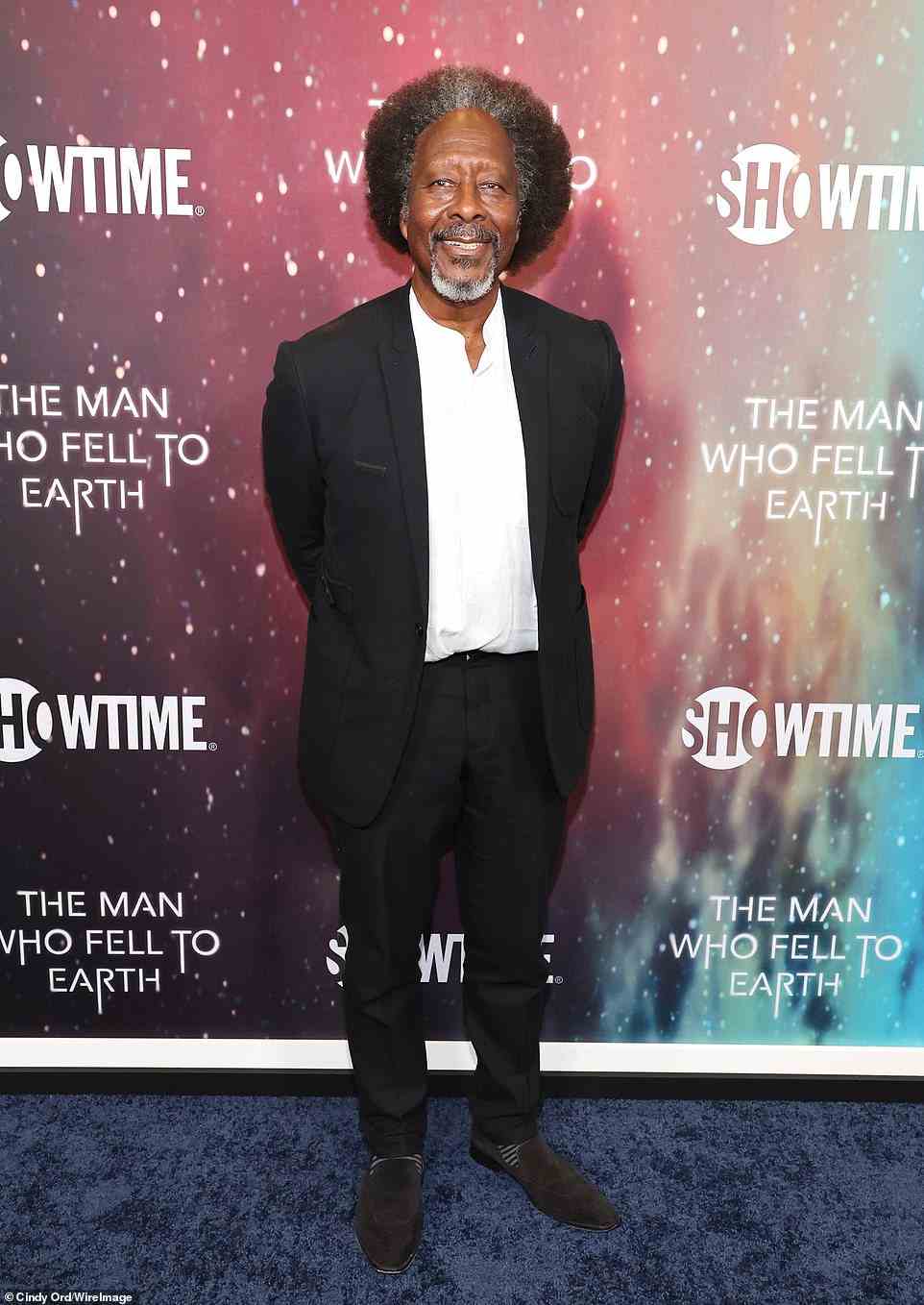 GQ smooth: SAG Award winner Clarke Peters - who plays Josiah Falls - looked dapper in a black suit sans necktie and matching suede loafers