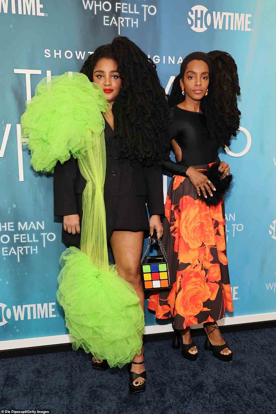 Double take! Twin influencers Tk Wonder and Cipriana Quann both wore black peep-toe heels with their colorful dresses