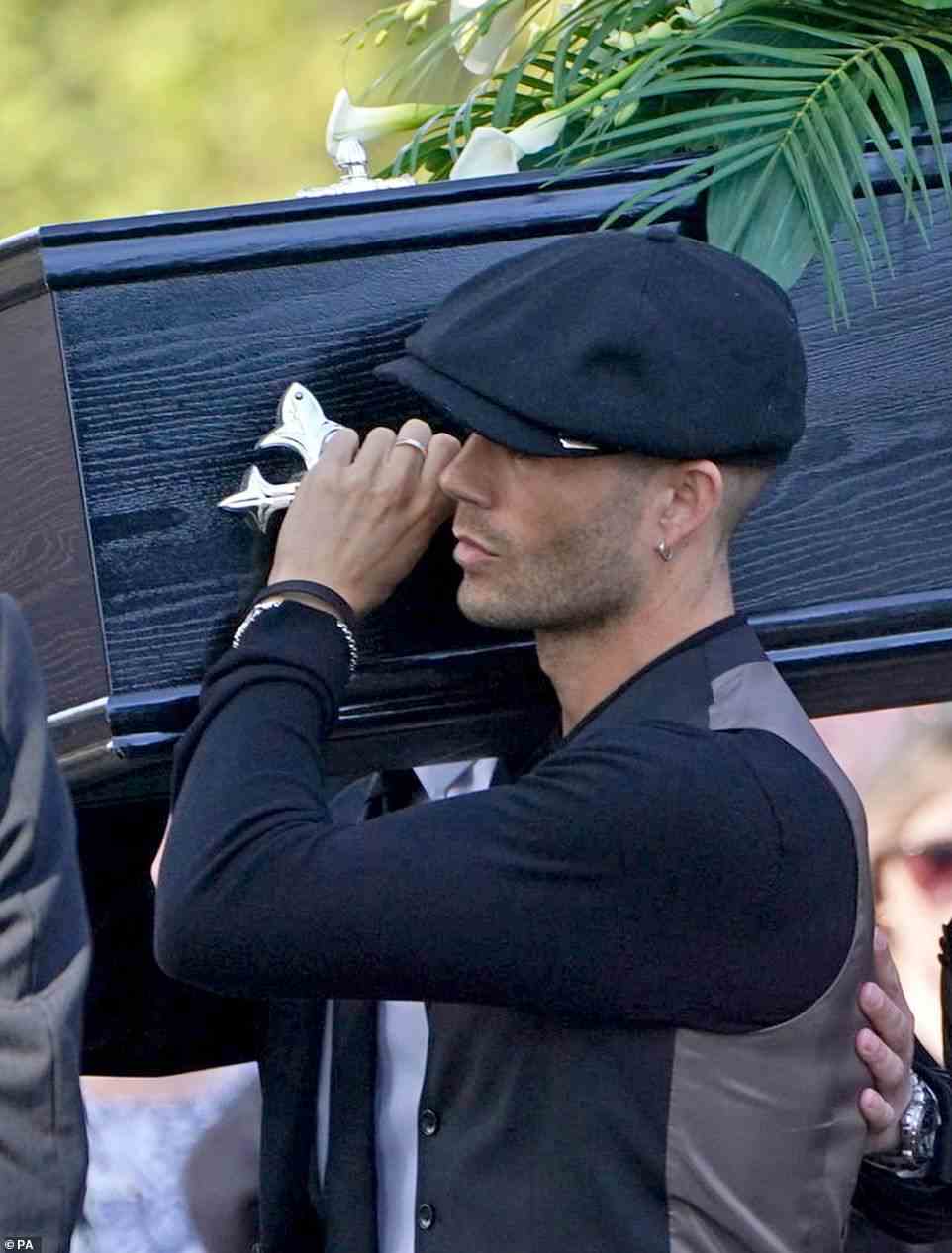 Bandmate: Max George was a pallbearer before delivering an emotional speech to the mourners during the service