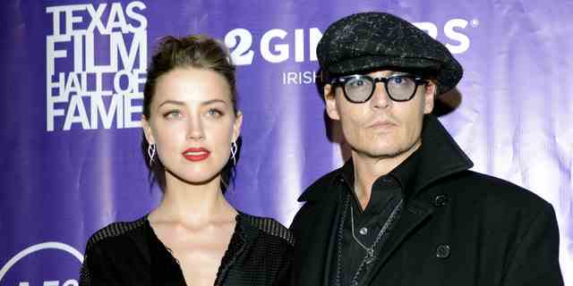 Amber Heard and Johnny Depp arrive at the 2014 Texas Film Awards.