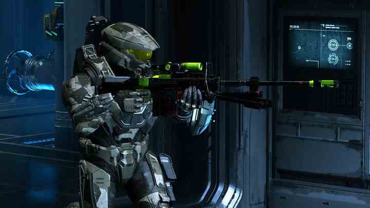 A Spartan lines up a shot with a sniper rifle in Halo Infinite.