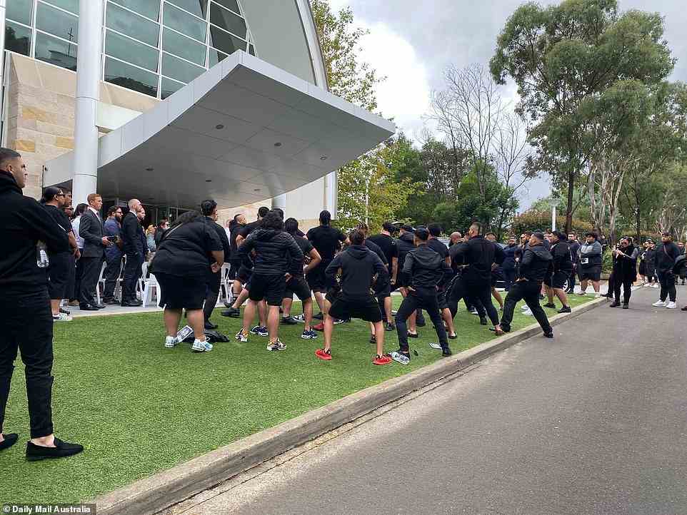 Mourners performed a moving haka after the service had ended, as his casket was being driven away